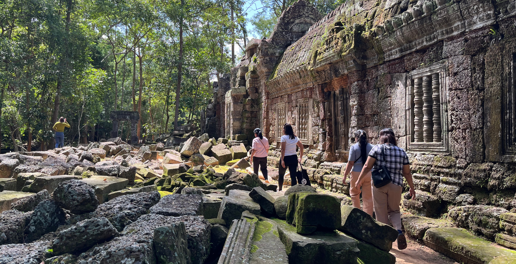 The women of Eco Soap Bank walking through the temple grounds